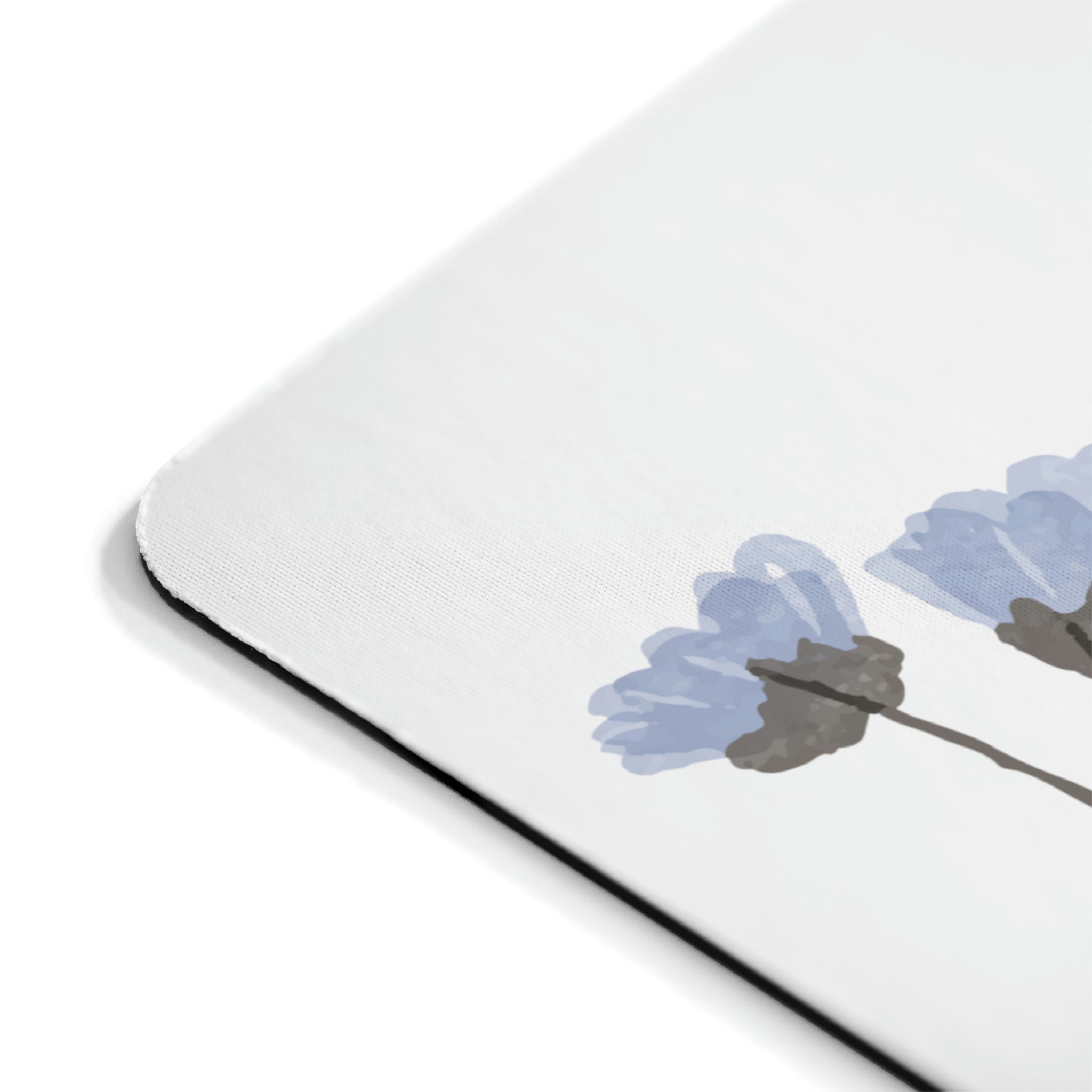 A vibrant blue flowers mouse pad with a soft surface and non-slip rubber base, perfect for enhancing any workspace.