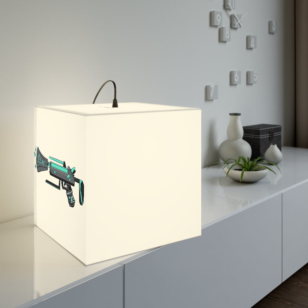 A stylish Blue Gun Personalized Lamp in a cube shape, showcasing its unique design and vibrant colors, perfect for indoor decor.