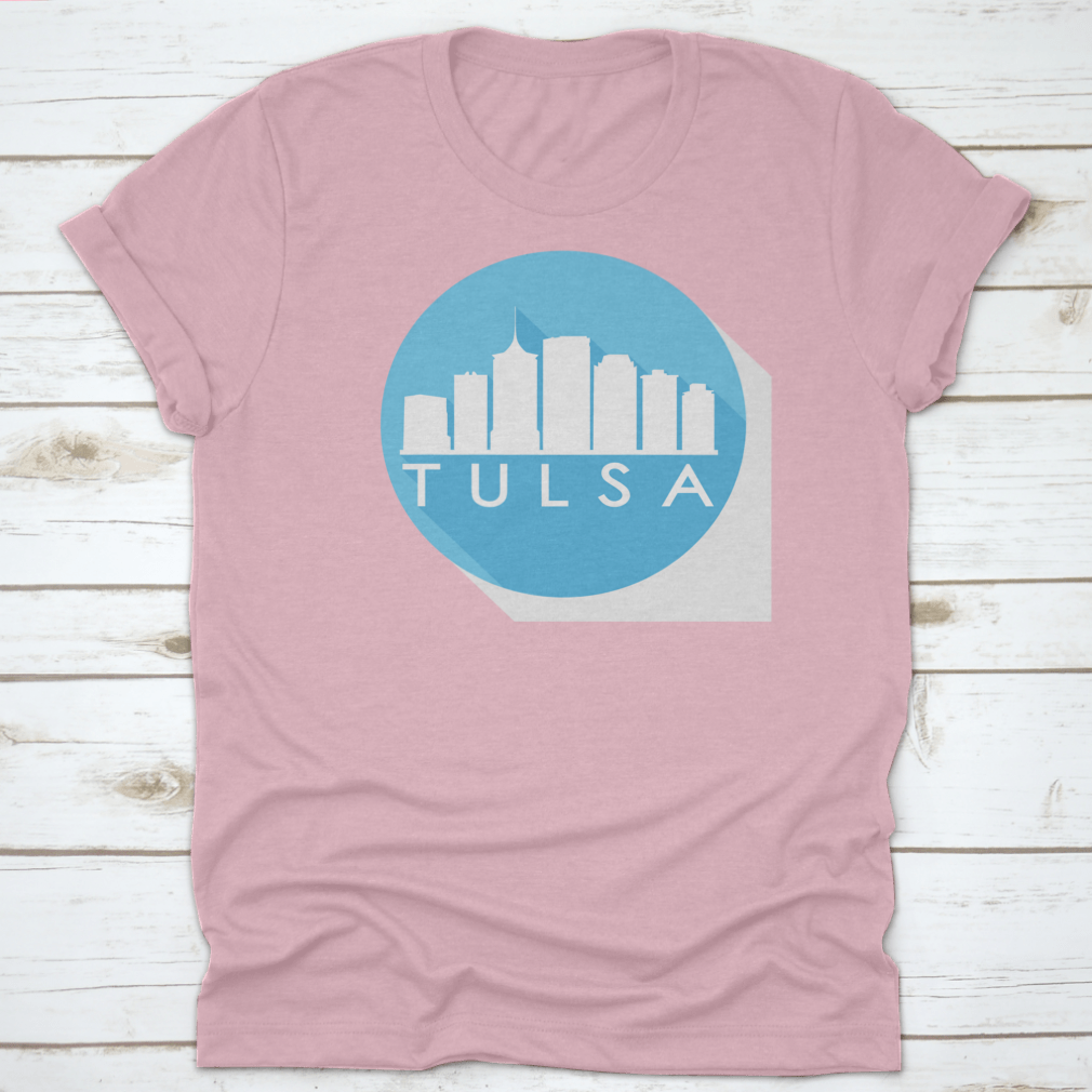 A round flat vector art illustration of the Tulsa skyline in blue, showcasing iconic buildings and structures.