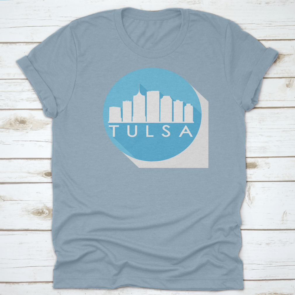 A round flat vector art illustration of the Tulsa skyline in blue, showcasing iconic buildings and structures.