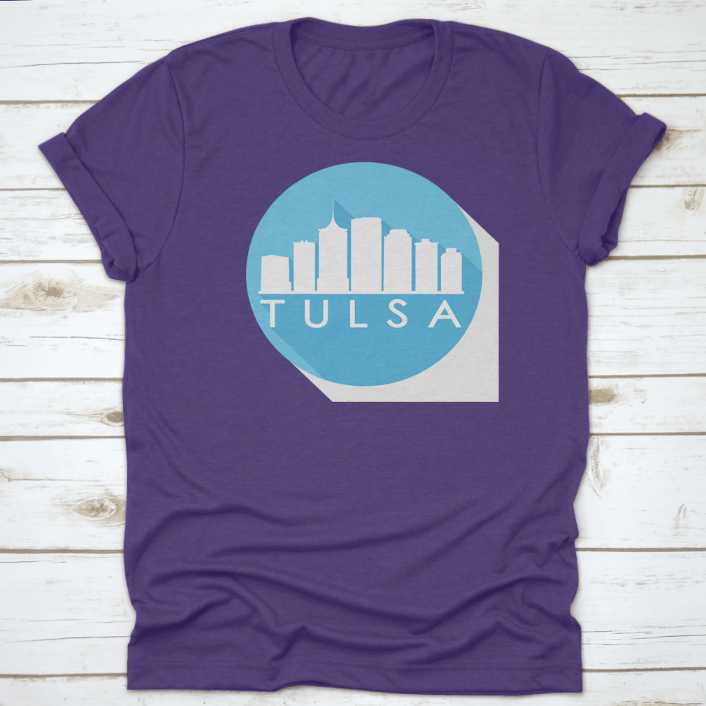 A round flat vector art illustration of the Tulsa skyline in blue, showcasing iconic buildings and structures.