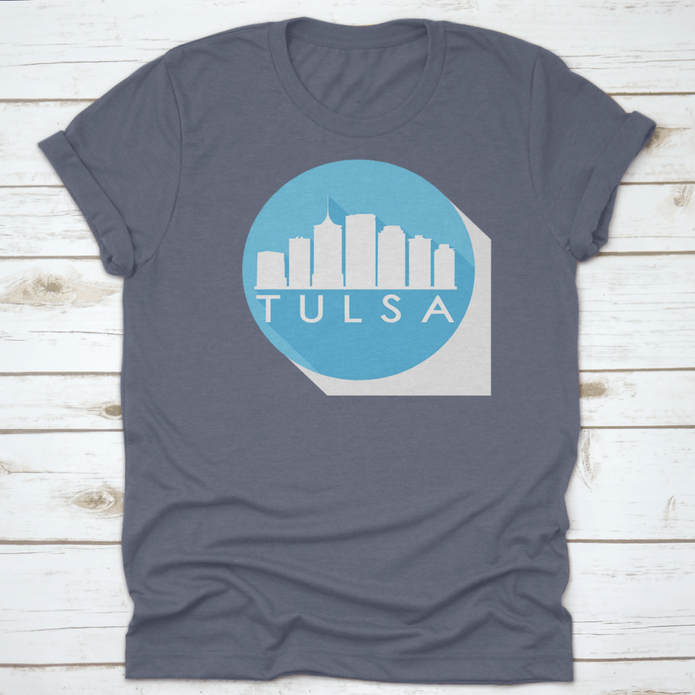 A round flat vector art illustration of the Tulsa skyline in blue, showcasing iconic buildings and structures.