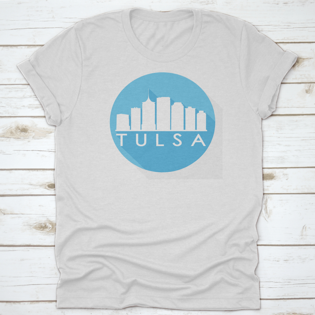 A round flat vector art illustration of the Tulsa skyline in blue, showcasing iconic buildings and structures.