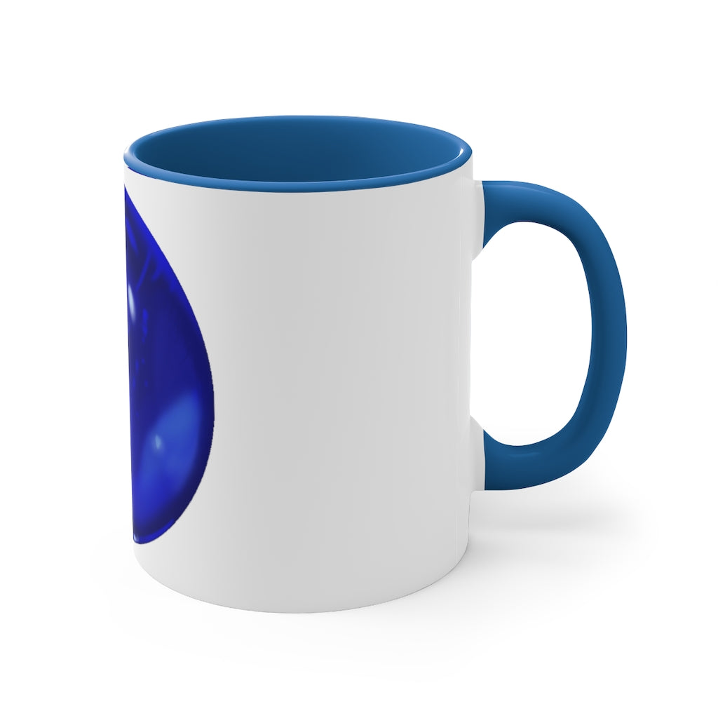 Blue Orb Accent Coffee Mug with a two-tone design featuring a white ceramic body and a colored interior and handle.