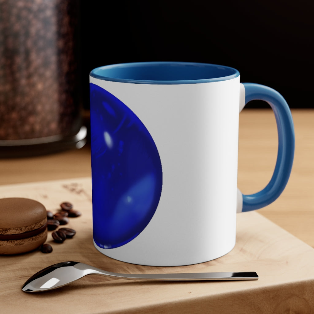 Blue Orb Accent Coffee Mug with a two-tone design featuring a white ceramic body and a colored interior and handle.