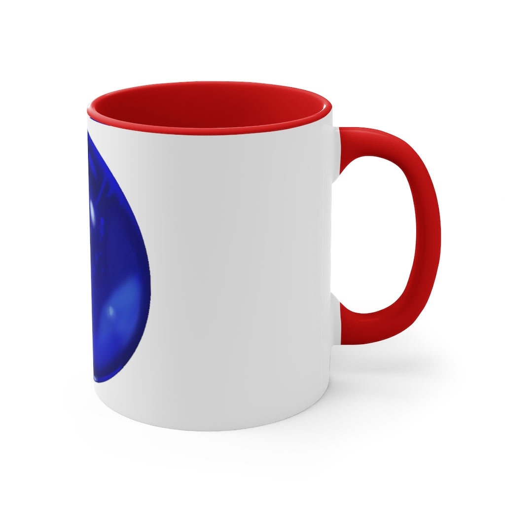 Blue Orb Accent Coffee Mug with a two-tone design featuring a white ceramic body and a colored interior and handle.