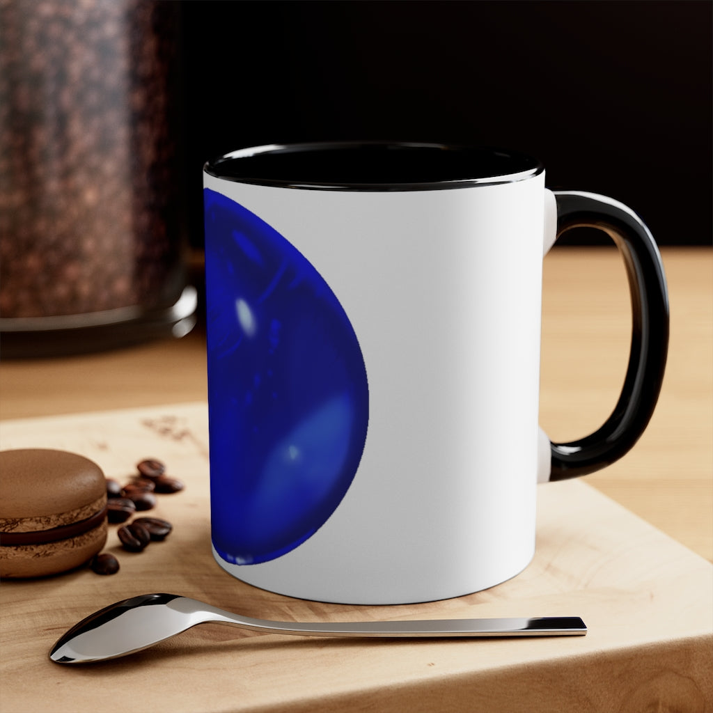 Blue Orb Accent Coffee Mug with a two-tone design featuring a white ceramic body and a colored interior and handle.