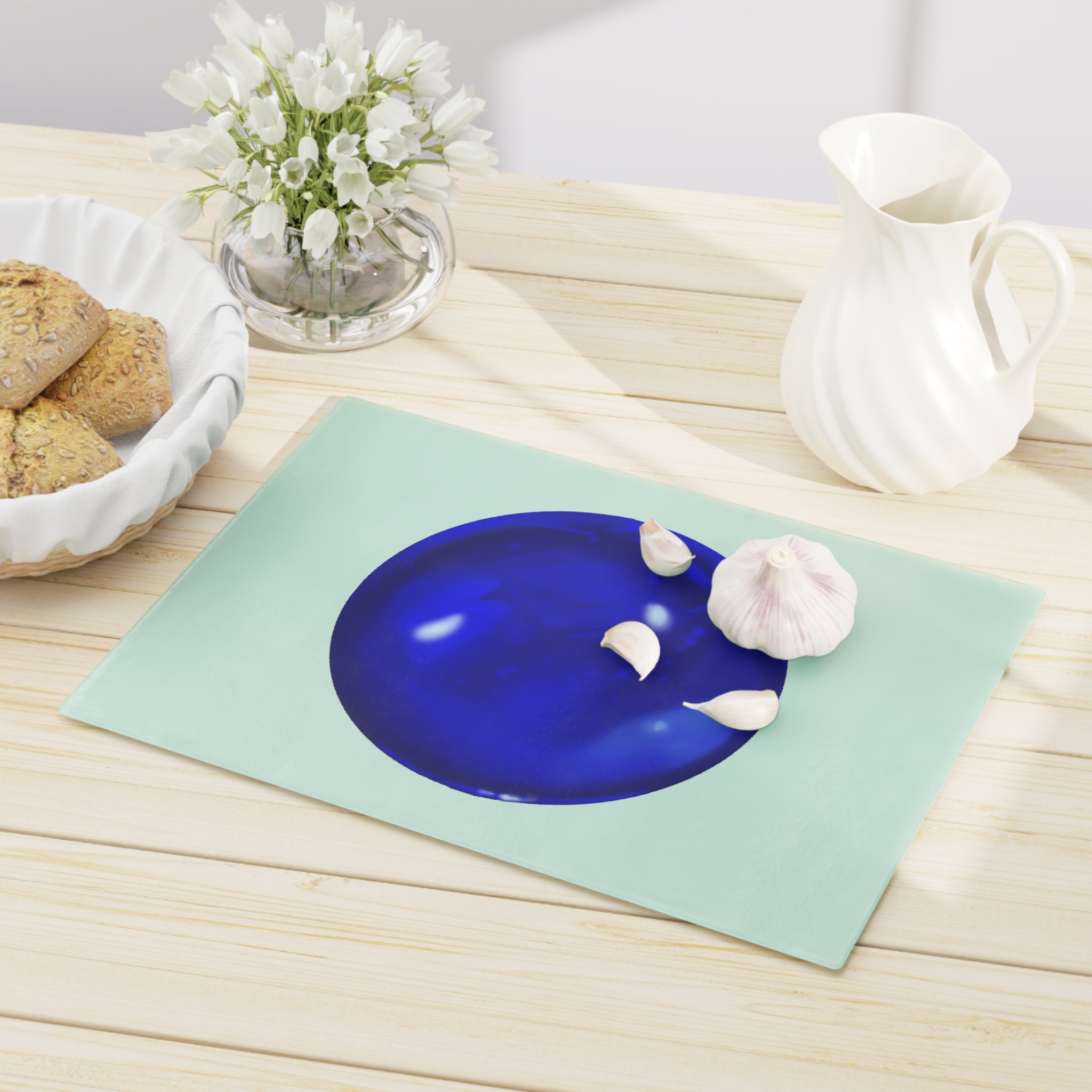 Blue Orb Cutting Board made of tempered glass with rubber dots for stability, showcasing a unique design perfect for kitchen use.