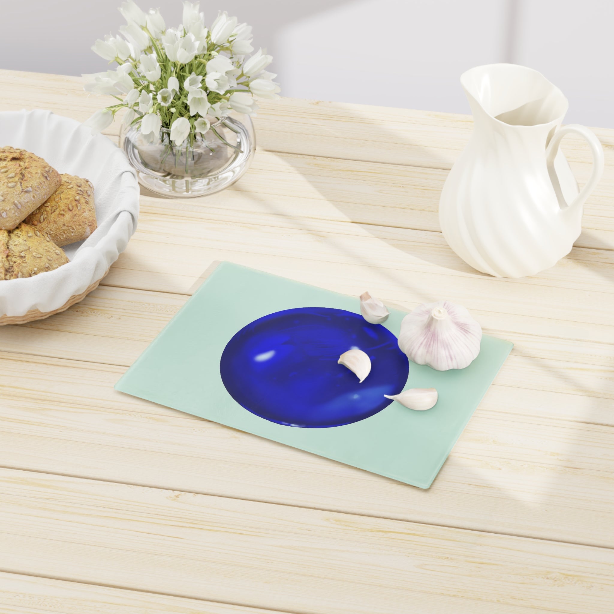 Blue Orb Cutting Board made of tempered glass with rubber dots for stability, showcasing a unique design perfect for kitchen use.