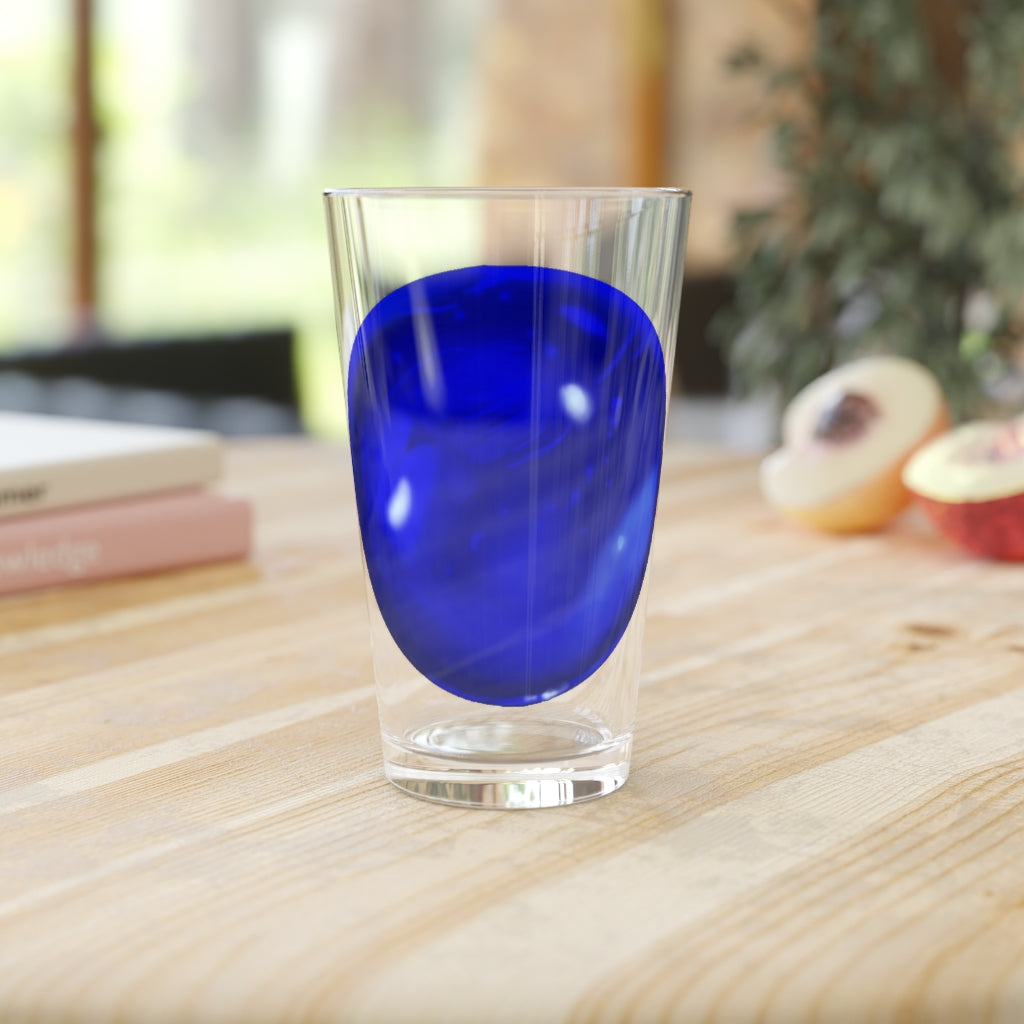 A clear 16oz Blue Orb Pint Glass showcasing its elegant design, perfect for personalized beverages.