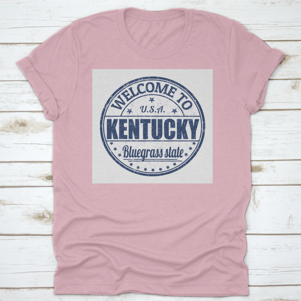 Blue Round Logo T-shirt featuring 'Welcome To Kentucky, Bluegrass State' design, showcasing a classic fit and quality fabric.