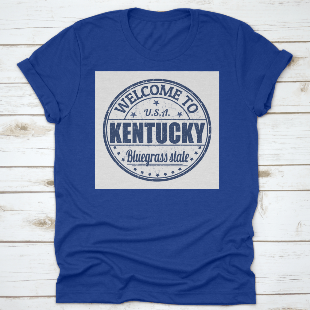 Blue Round Logo T-shirt featuring 'Welcome To Kentucky, Bluegrass State' design, showcasing a classic fit and quality fabric.