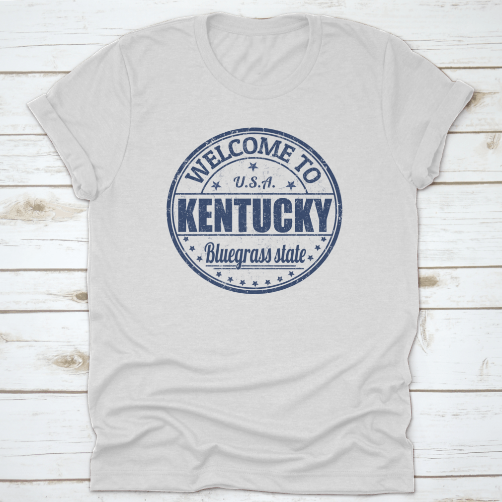 Blue Round Logo T-shirt featuring 'Welcome To Kentucky, Bluegrass State' design, showcasing a classic fit and quality fabric.