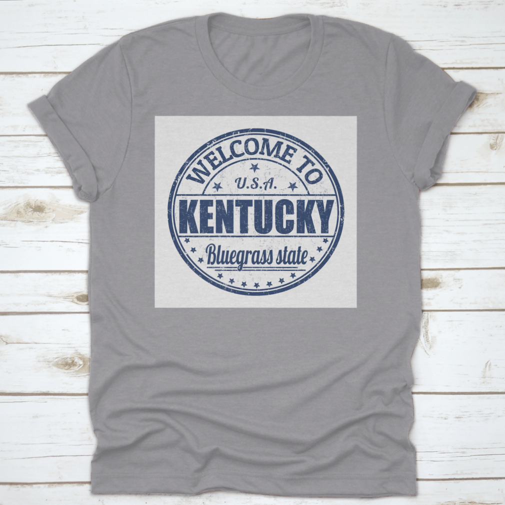 Blue Round Logo T-shirt featuring 'Welcome To Kentucky, Bluegrass State' design, showcasing a classic fit and quality fabric.