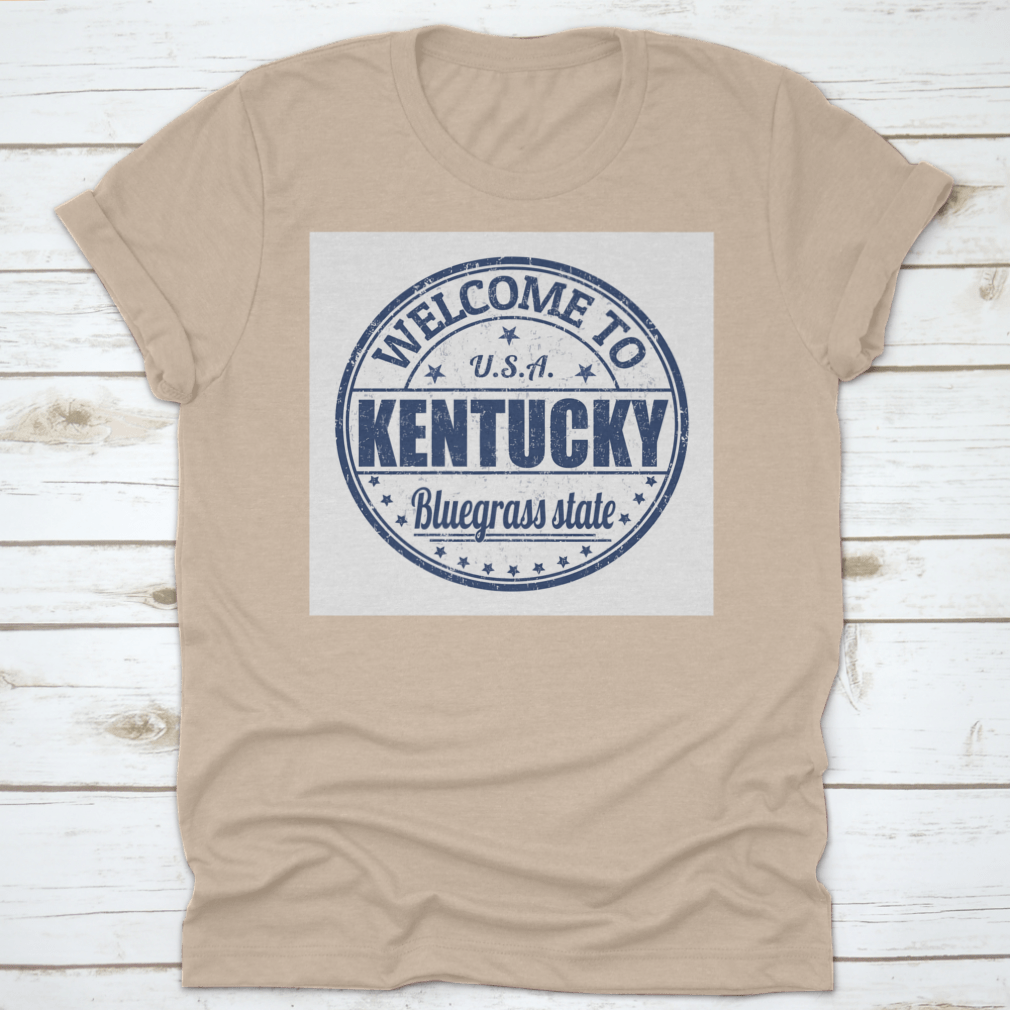 Blue Round Logo T-shirt featuring 'Welcome To Kentucky, Bluegrass State' design, showcasing a classic fit and quality fabric.