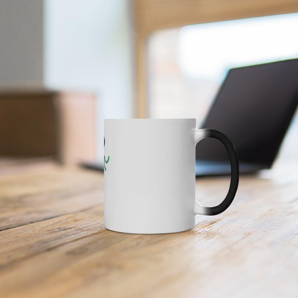 A blue ceramic mug that changes color when filled with hot liquid, featuring a rounded design and C-handle.