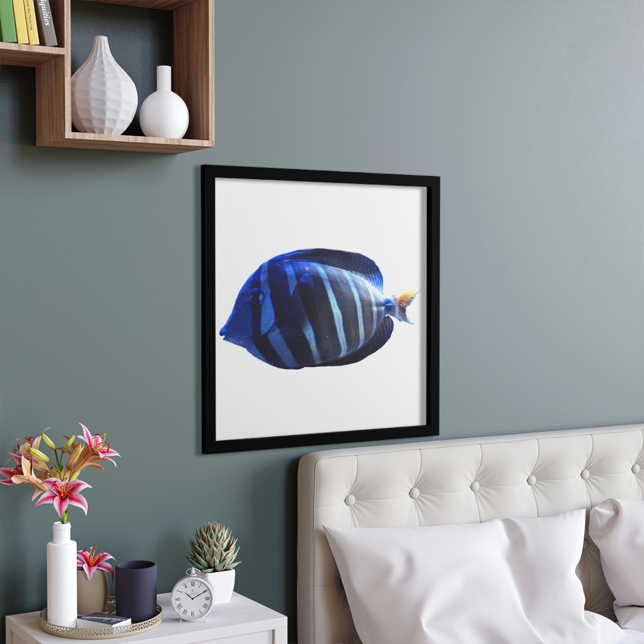 A beautifully framed poster featuring a blue striped fish, showcasing vibrant colors and a hand-crafted wooden frame.