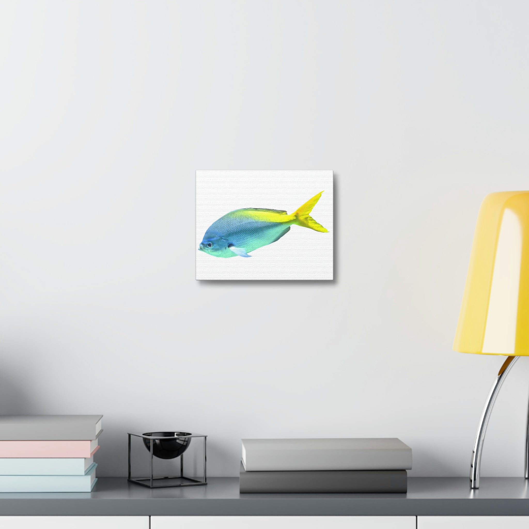 A vibrant blue and yellow fish printed on a stretched canvas, showcasing high-quality detail and color.