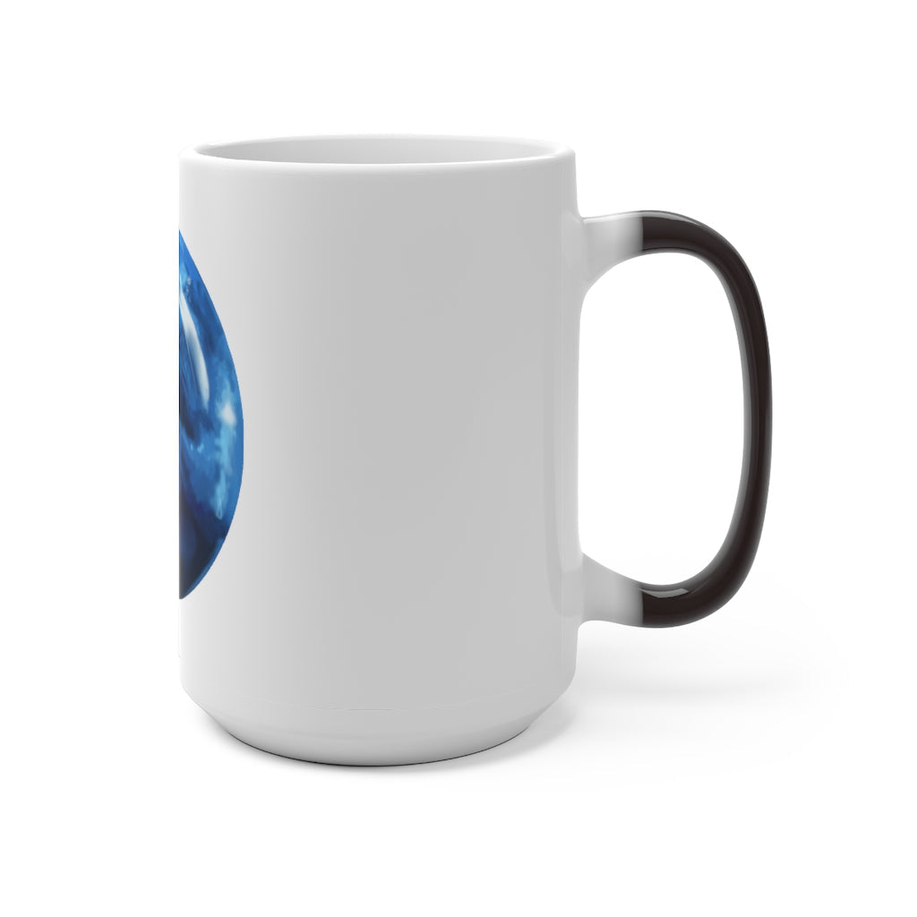 A blue ceramic mug that changes color when filled with hot liquid, showcasing its unique design and C-handle.