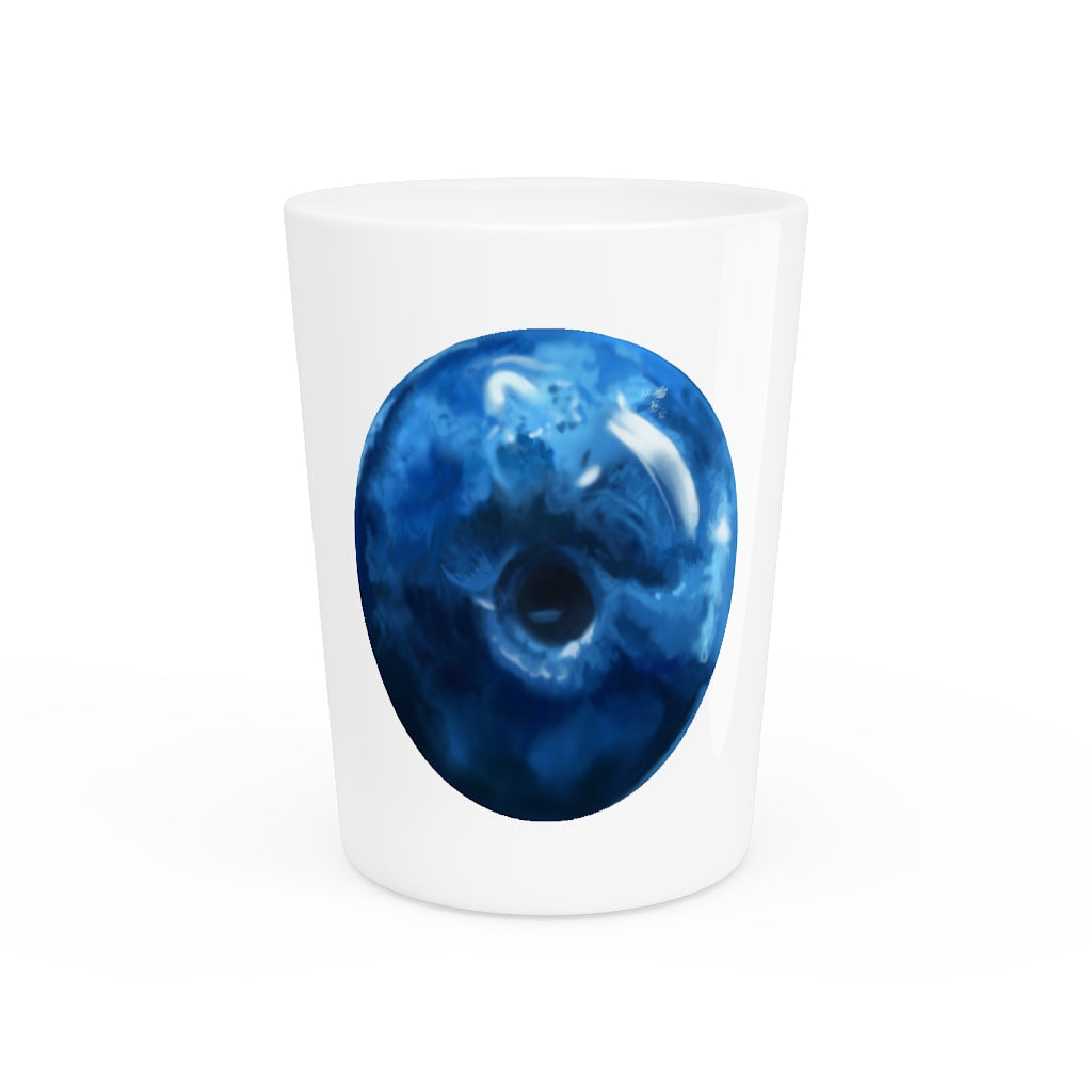 A stylish Blueberry Shot Glass made of ceramic, featuring a customizable design with a white or black interior, perfect for gatherings and gifts.