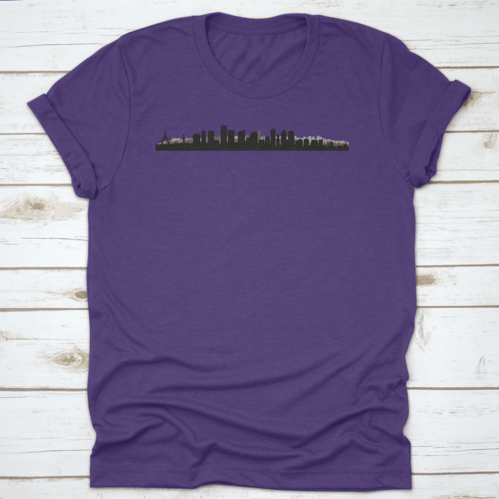 A panoramic view of the Boston skyline, showcasing iconic buildings and cityscape, printed on a comfortable t-shirt.