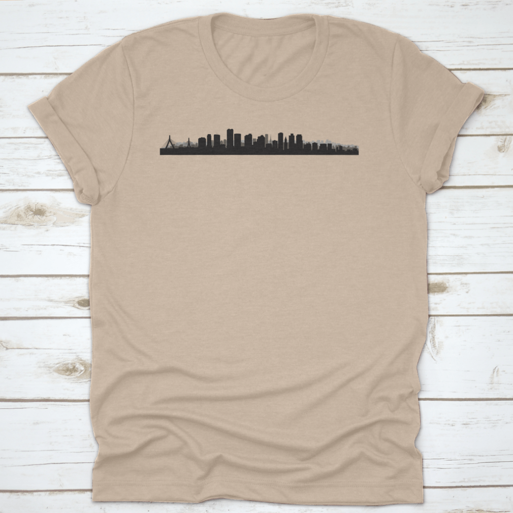 A panoramic view of the Boston skyline, showcasing iconic buildings and cityscape, printed on a comfortable t-shirt.