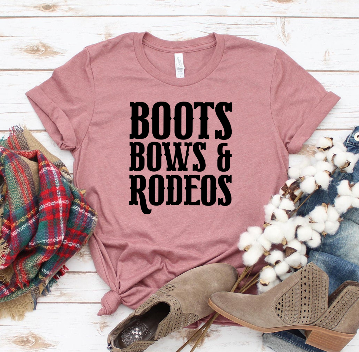 A stylish Boots Bows And Rodeos T-shirt made from premium ring spun cotton, featuring a high-end flex print design.