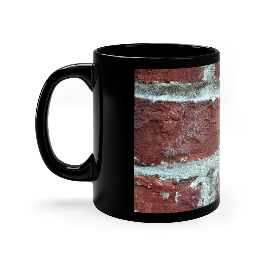 Bricks 11oz black ceramic mug with a sleek design, perfect for coffee, tea, or hot chocolate, showcasing customizable options.