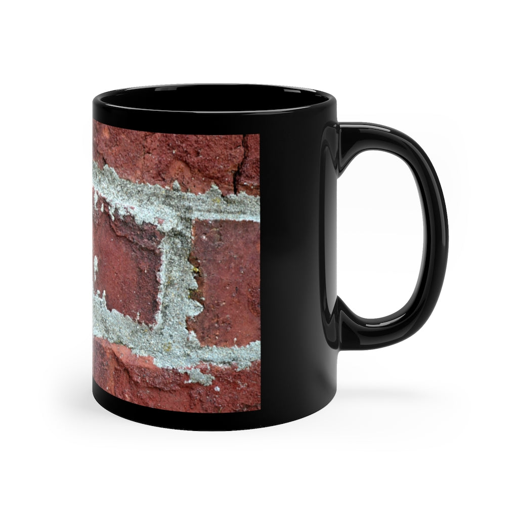 Bricks 11oz black ceramic mug with a sleek design, perfect for coffee, tea, or hot chocolate, showcasing customizable options.