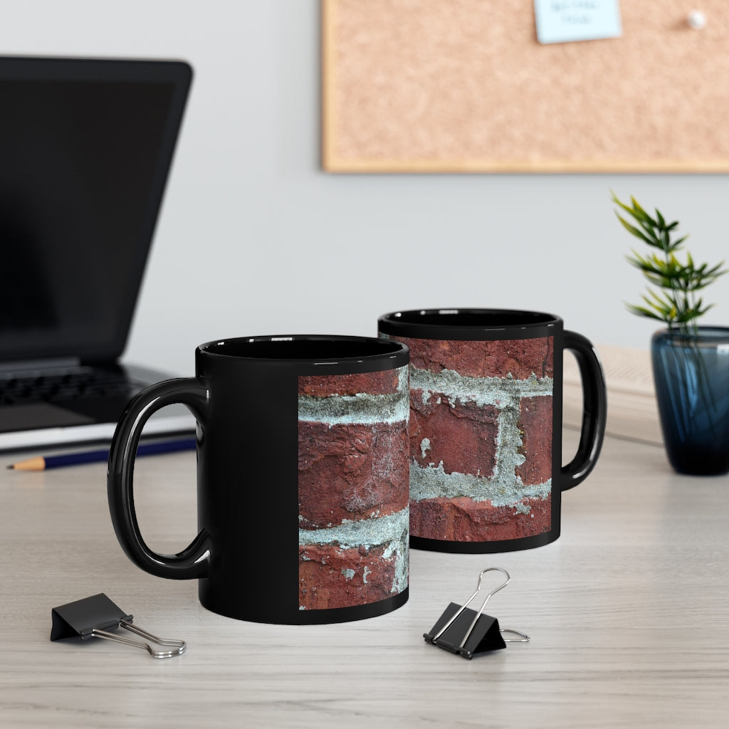 Bricks 11oz black ceramic mug with a sleek design, perfect for coffee, tea, or hot chocolate, showcasing customizable options.