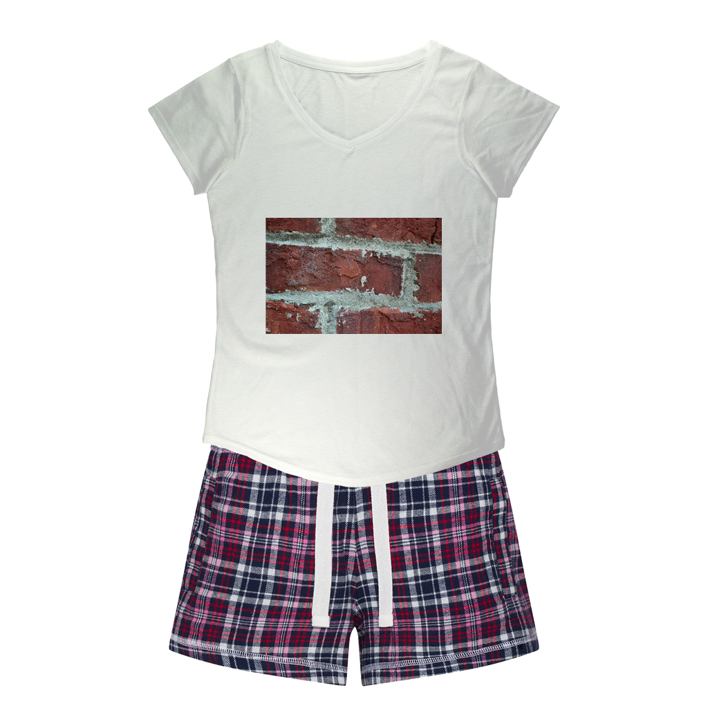 Women's Sleepy Tee and Flannel Short set featuring a relaxed fit T-shirt and vibrant flannel shorts, perfect for cozy nights.