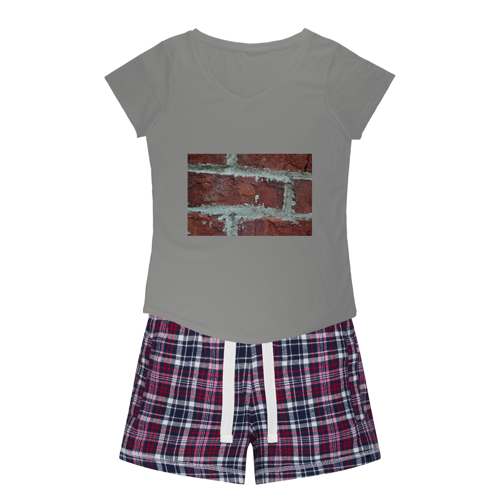 Women's Sleepy Tee and Flannel Short set featuring a relaxed fit T-shirt and vibrant flannel shorts, perfect for cozy nights.