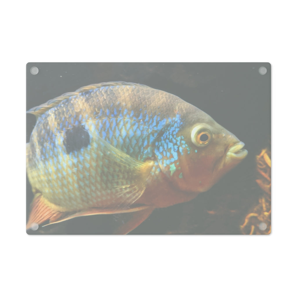 Brown and orange fish design tempered glass cutting board with rubber dots for stability.