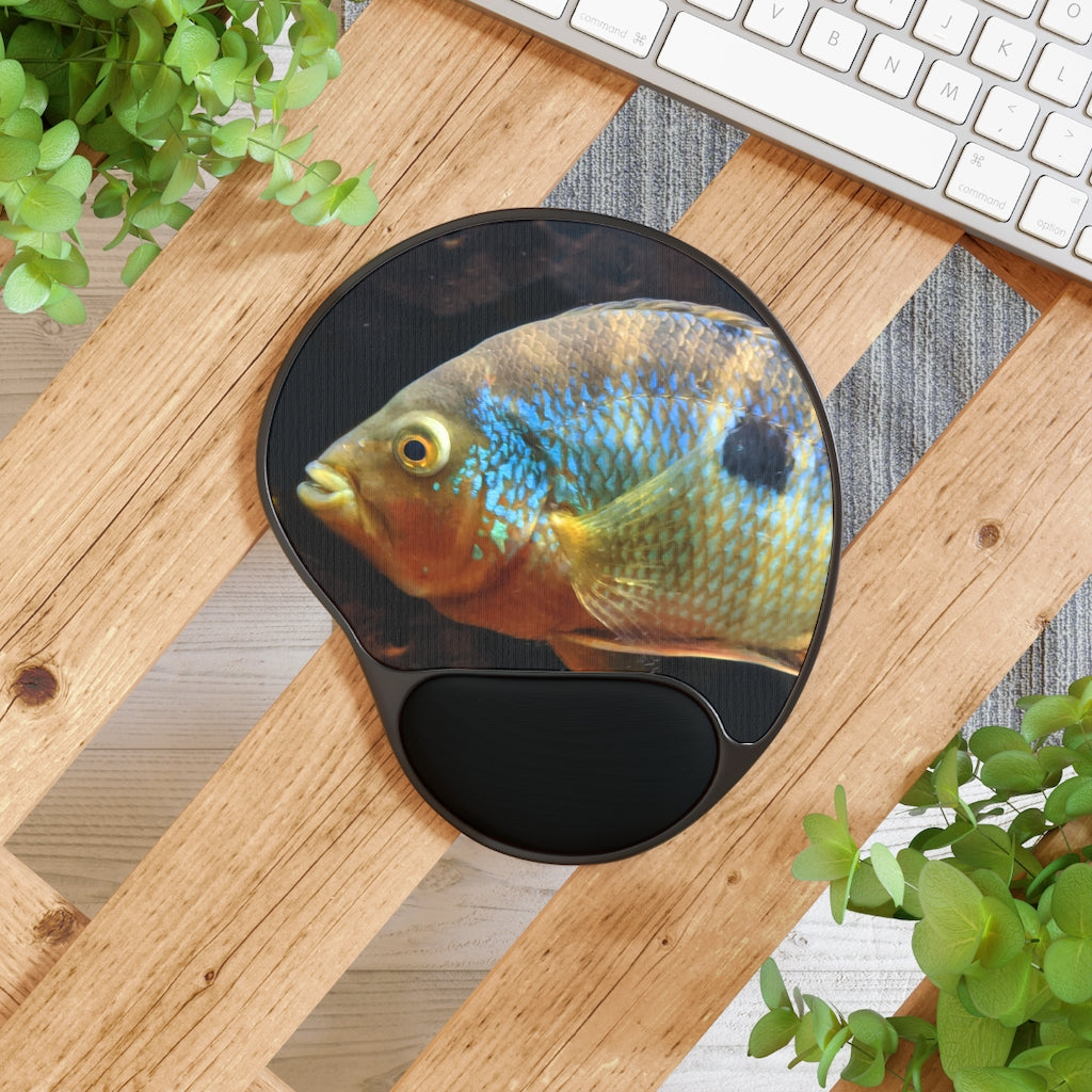 Brown and orange fish mouse pad with ergonomic wrist rest, featuring a unique design and durable base.