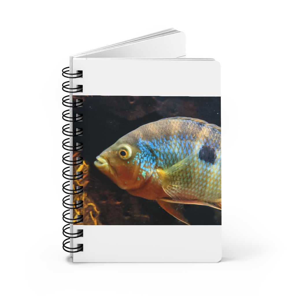 Brown and orange spiral bound journal featuring a vibrant fish design on the cover, with a glossy laminated finish and lined pages inside.