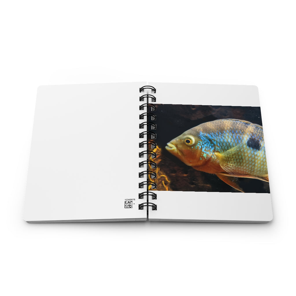 Brown and orange spiral bound journal featuring a vibrant fish design on the cover, with a glossy laminated finish and lined pages inside.