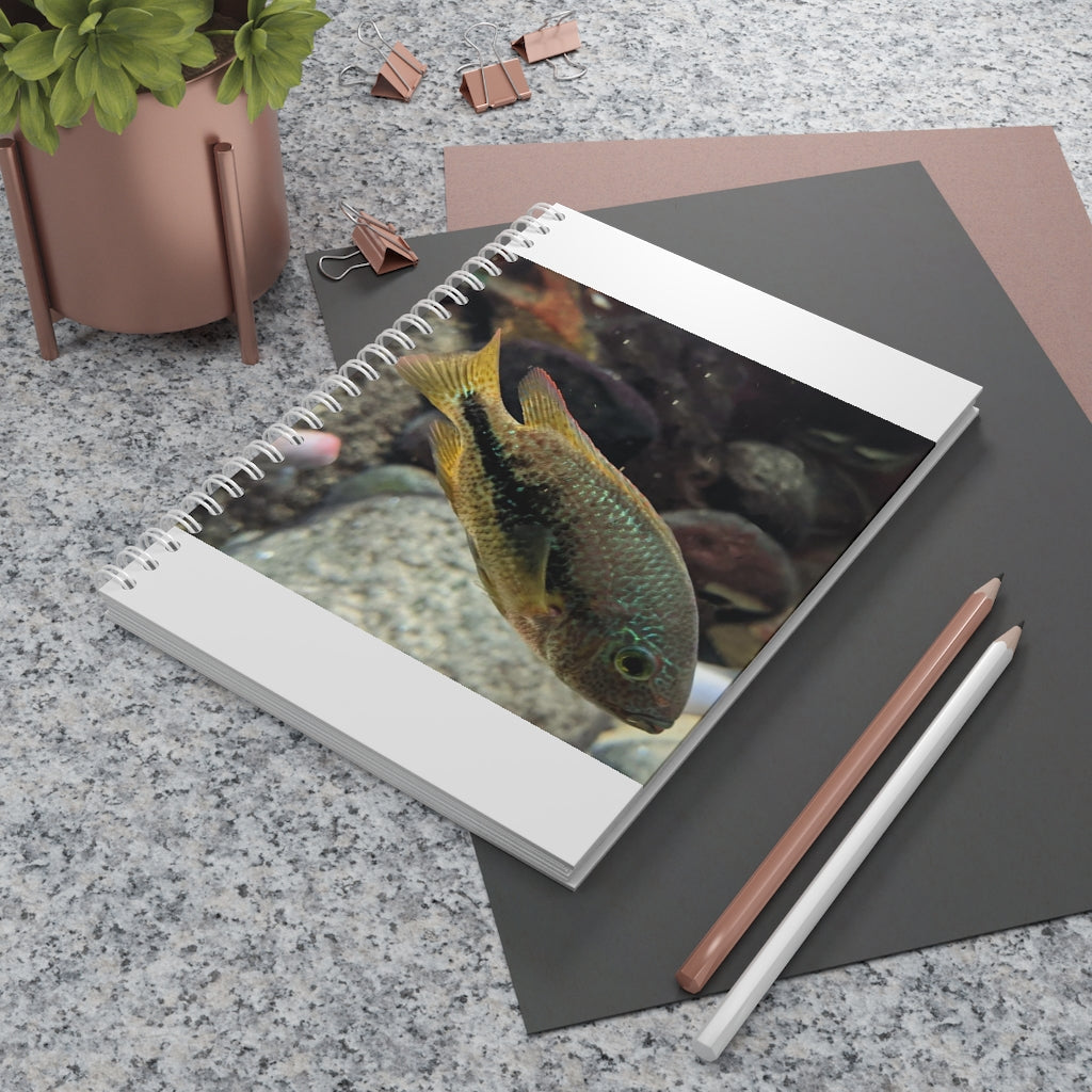 Brown and orange spiral notebook featuring a fish design on the cover, showcasing customizable front and back covers.