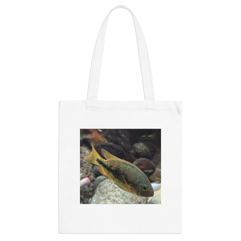 Brown and orange fish tote bag with long handles, made of 100% cotton fabric, featuring a vibrant fish design.