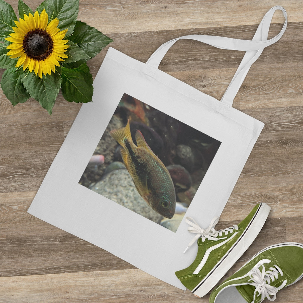 Brown and orange fish tote bag with long handles, made of 100% cotton fabric, featuring a vibrant fish design.