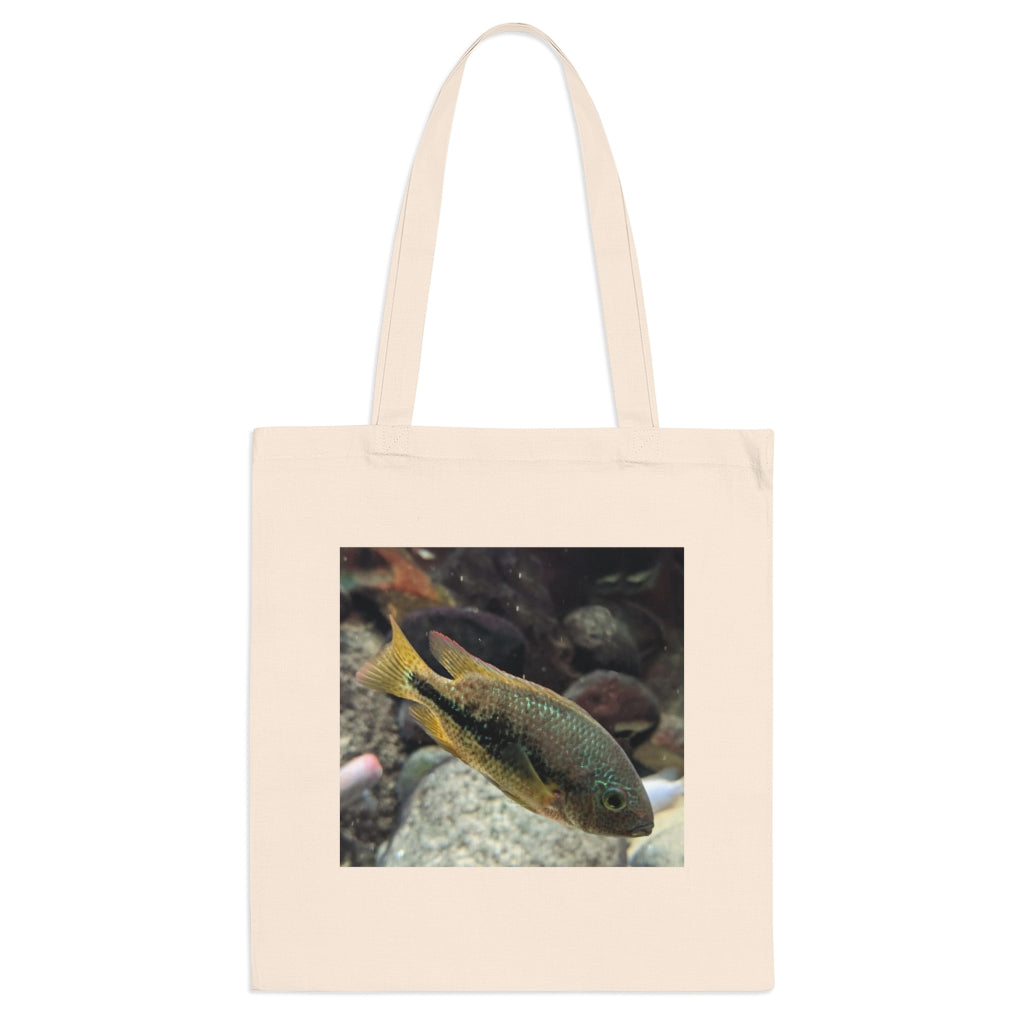 Brown and orange fish tote bag with long handles, made of 100% cotton fabric, featuring a vibrant fish design.