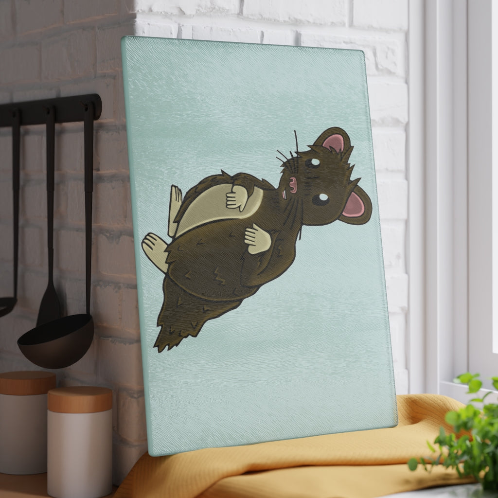 Brown Hamster Glass Cutting Board with textured surface and rubber dots for stability, available in two sizes.