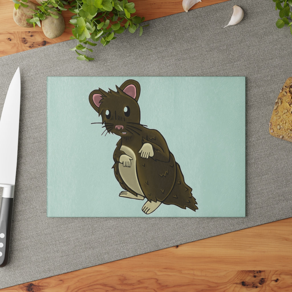 Brown Hamster Glass Cutting Board with textured surface and rubber dots for stability, available in two sizes.