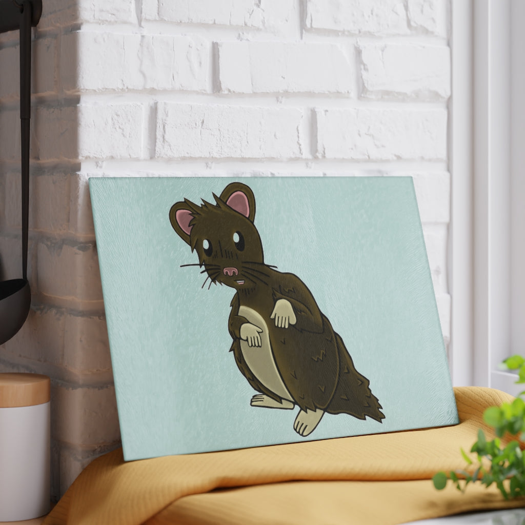 Brown Hamster Glass Cutting Board with textured surface and rubber dots for stability, available in two sizes.