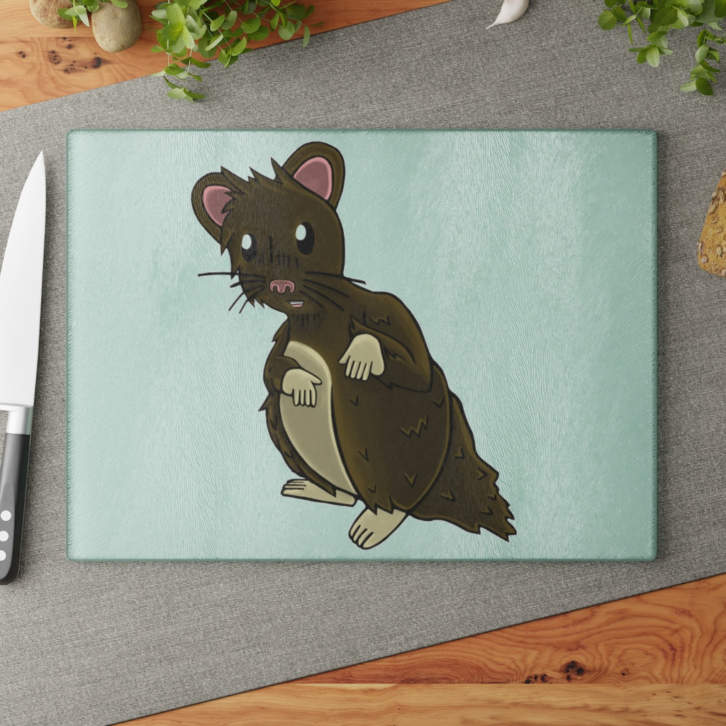 Brown Hamster Glass Cutting Board with textured surface and rubber dots for stability, available in two sizes.