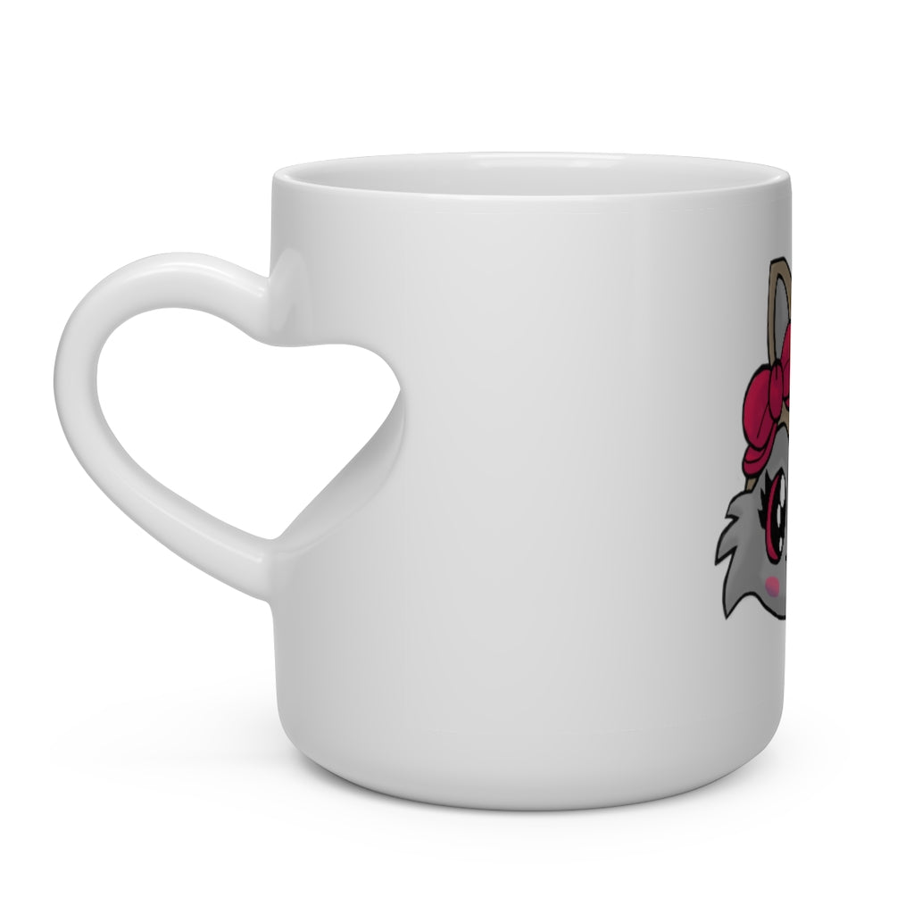 A white ceramic mug with a heart-shaped handle featuring a cute brown kitty head design, perfect for hot beverages.