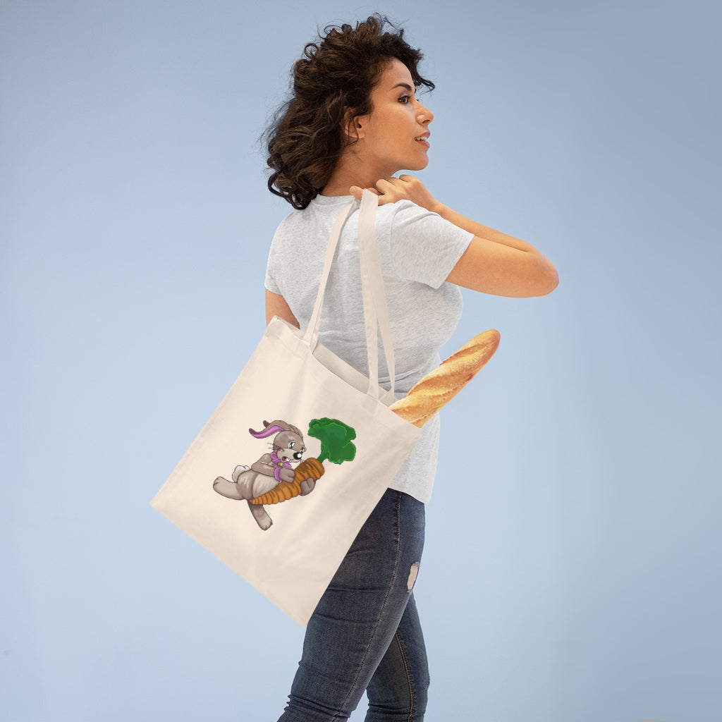 A colorful Bunny with Carrot Tote Bag made of 100% cotton, featuring cross-stitched handles for added durability.