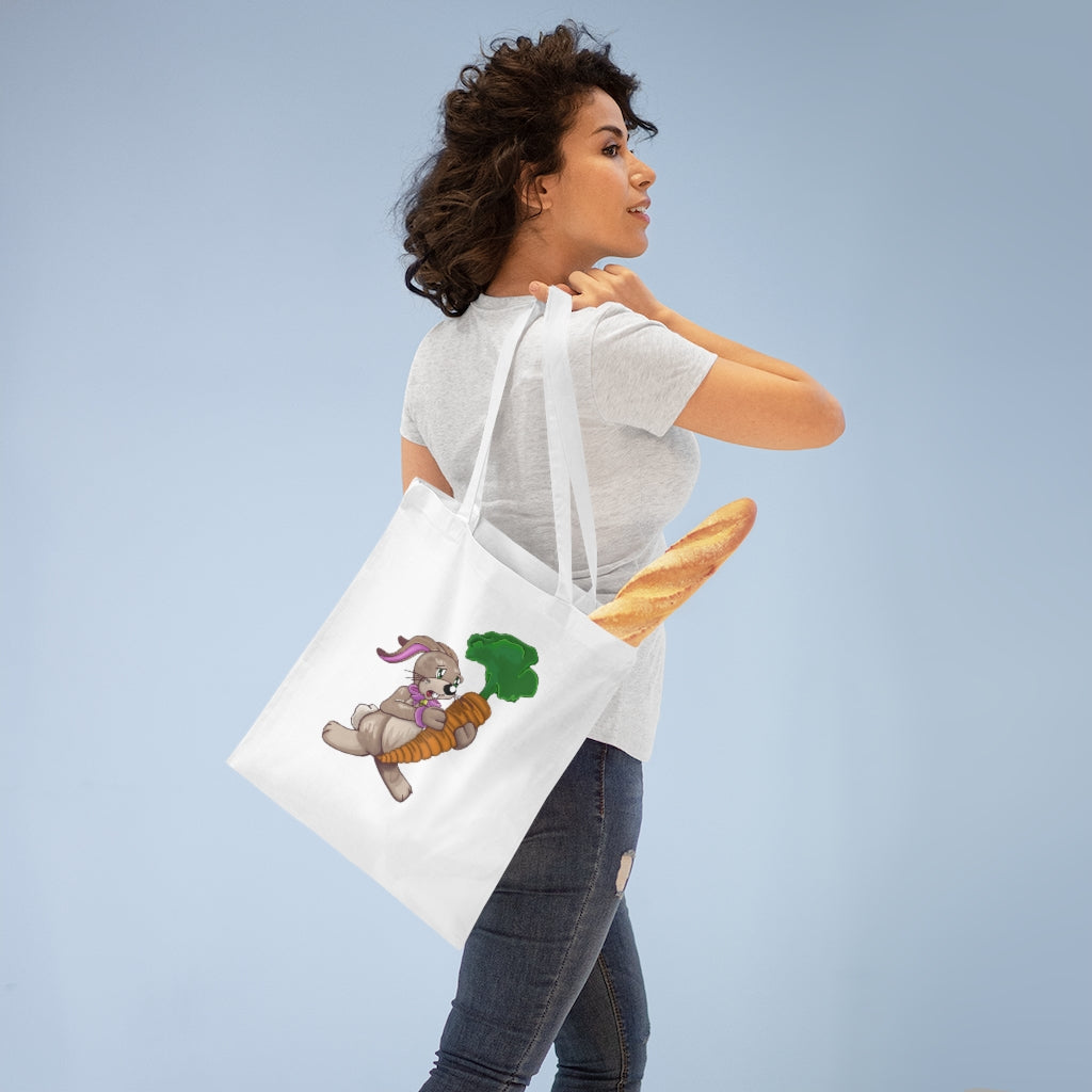 A colorful Bunny with Carrot Tote Bag made of 100% cotton, featuring cross-stitched handles for added durability.