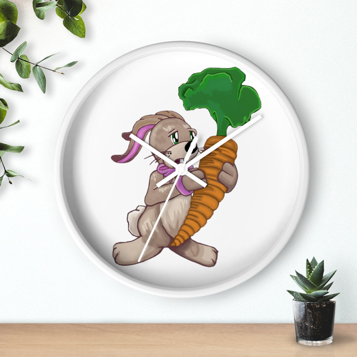 A whimsical wall clock featuring a bunny holding a carrot, set in a wooden frame with a clear plexiglass face.