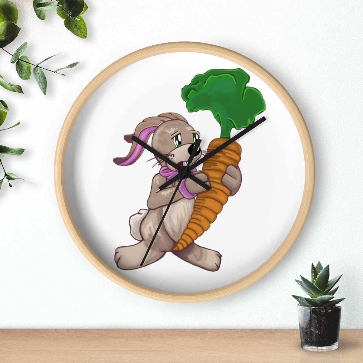 A whimsical wall clock featuring a bunny holding a carrot, set in a wooden frame with a clear plexiglass face.