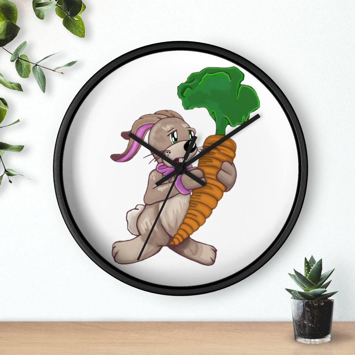 A whimsical wall clock featuring a bunny holding a carrot, set in a wooden frame with a clear plexiglass face.